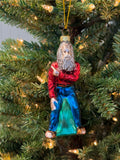 Hand-blown glass ornament of the Laguna Beach Greeter, a bearded man in a red shirt and blue pants