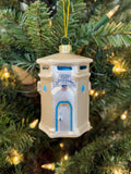 Hand-blown glass ornament of the white Laguna Beach lifeguard tower with a blue door and lifeguard sign