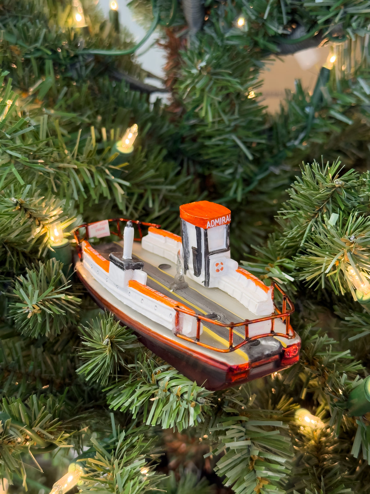 Hand-blown glass Balboa Island ferry ornament, front three-quarter view of the deck and pilot house